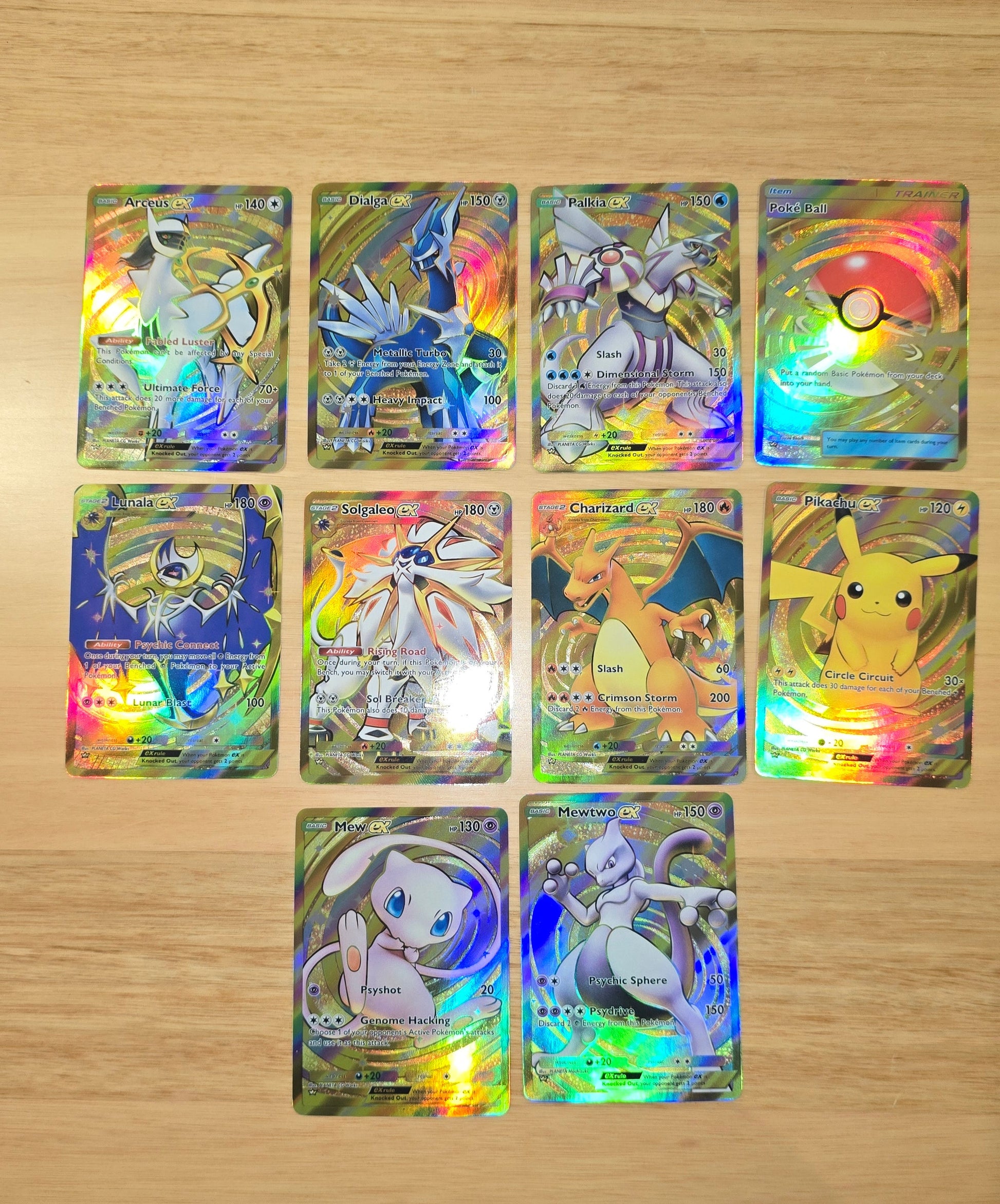 Collection of colorful trading cards on a wooden surface